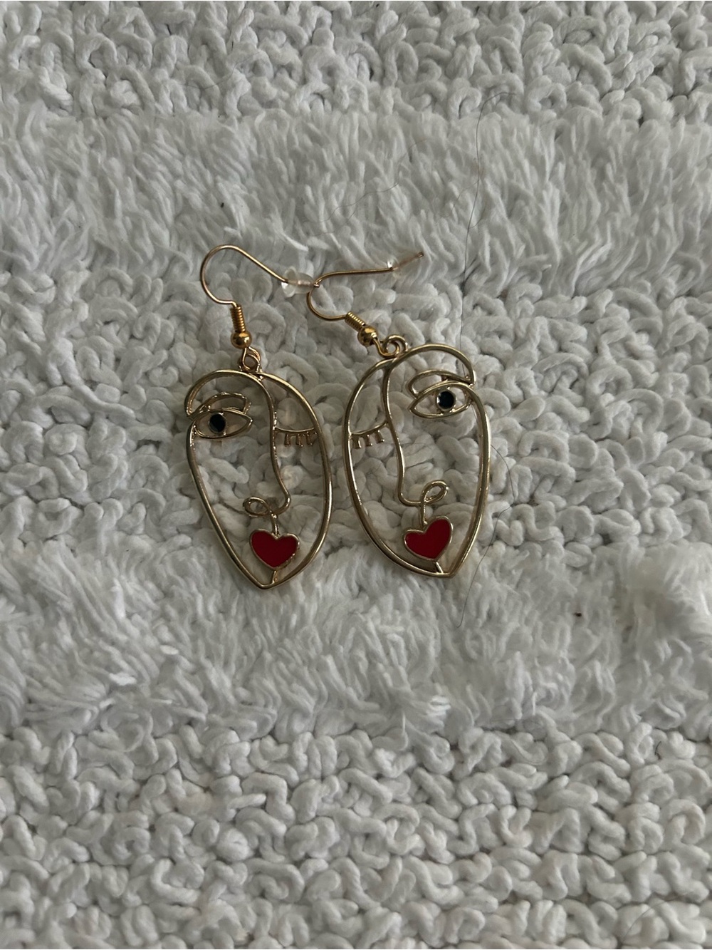 Gold Abstract Face Earrings with Red Heart Accent